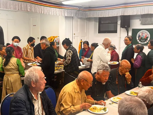 Community members sharing a meal together