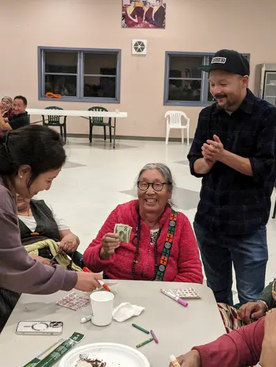 Elder celebrating bingo win