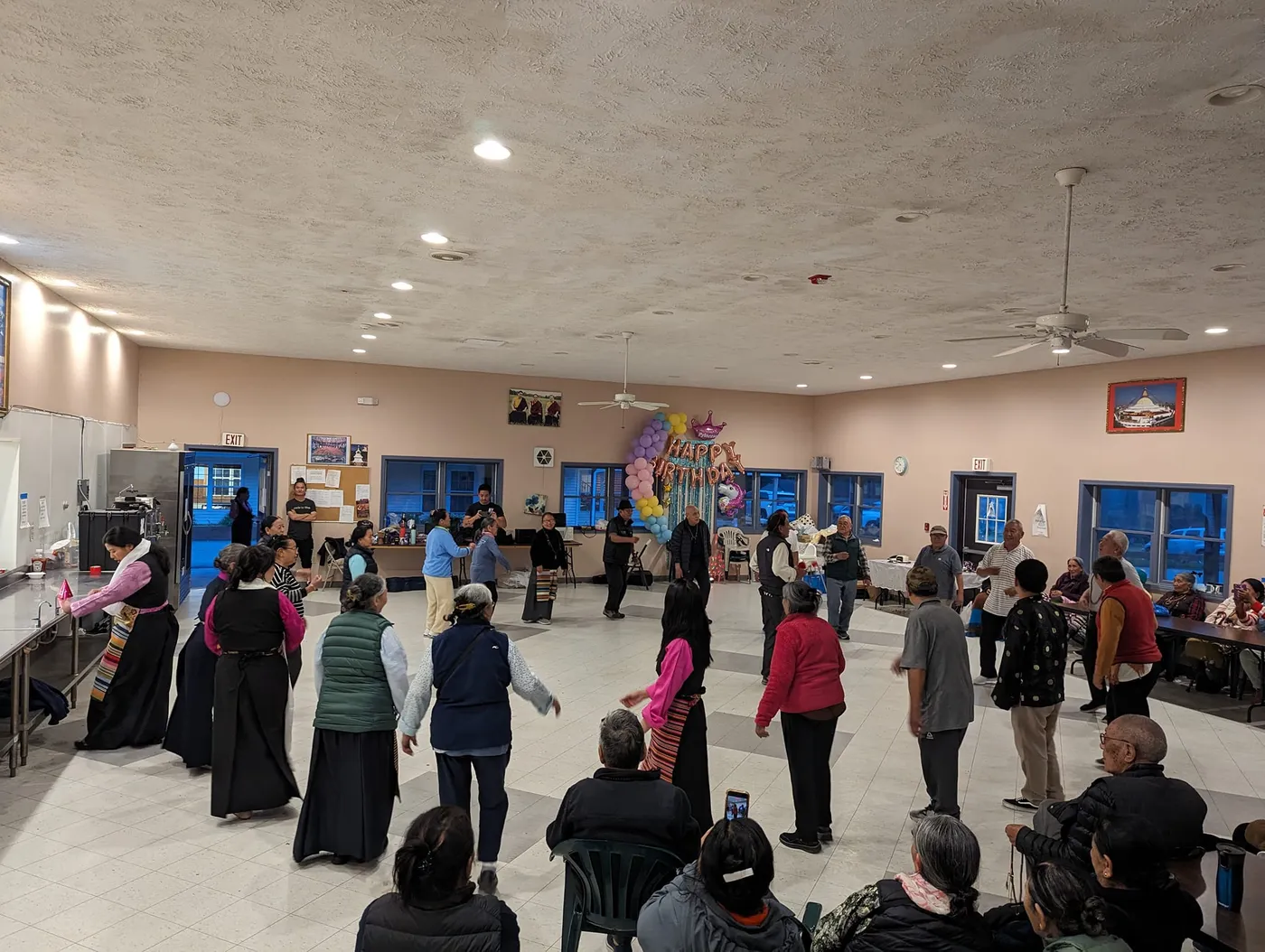 Himalayan elders dancing together in celebration