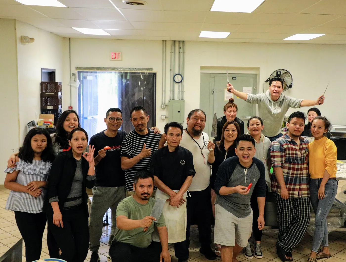 Volunteers and elders together in the kitchen